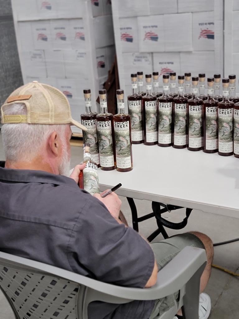 new Chico creek rye singles barrel bottles being signed